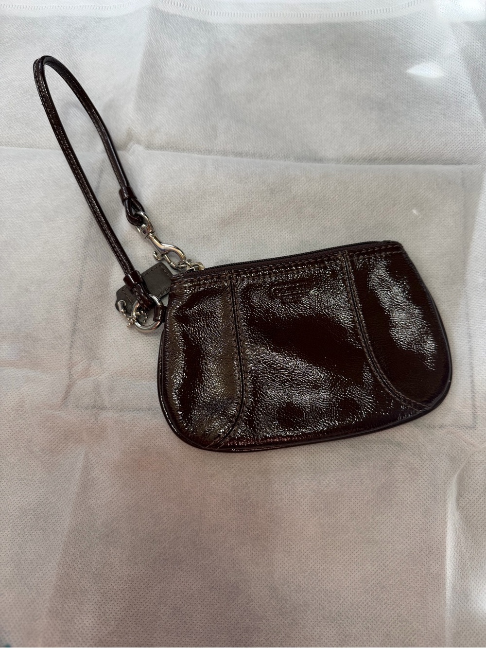Coach Patent Leather Wristlet Clutch in Dark Brown
